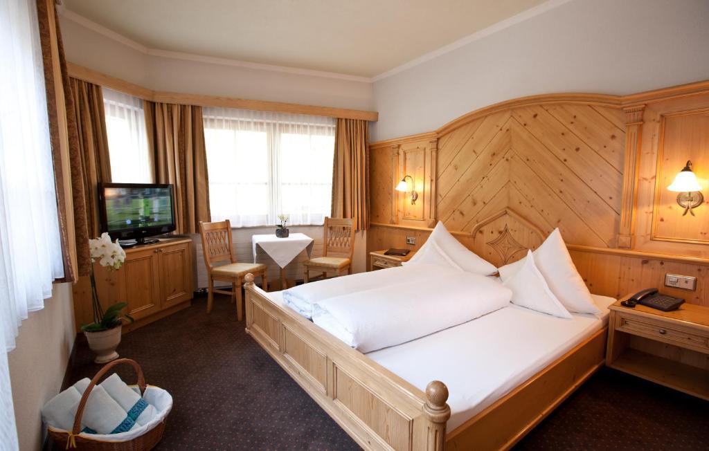 Hotel Astoria Samnaun Pokoj fotografie